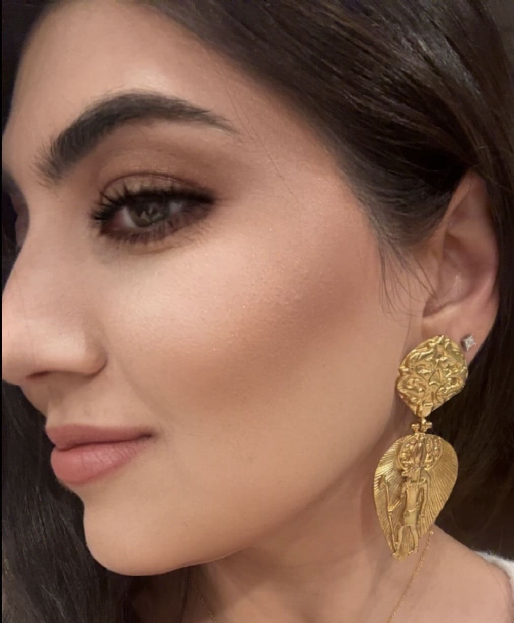 women wearing artisanal eco-friendly gold-plated hieroglyphics bold statement dangle earrings 