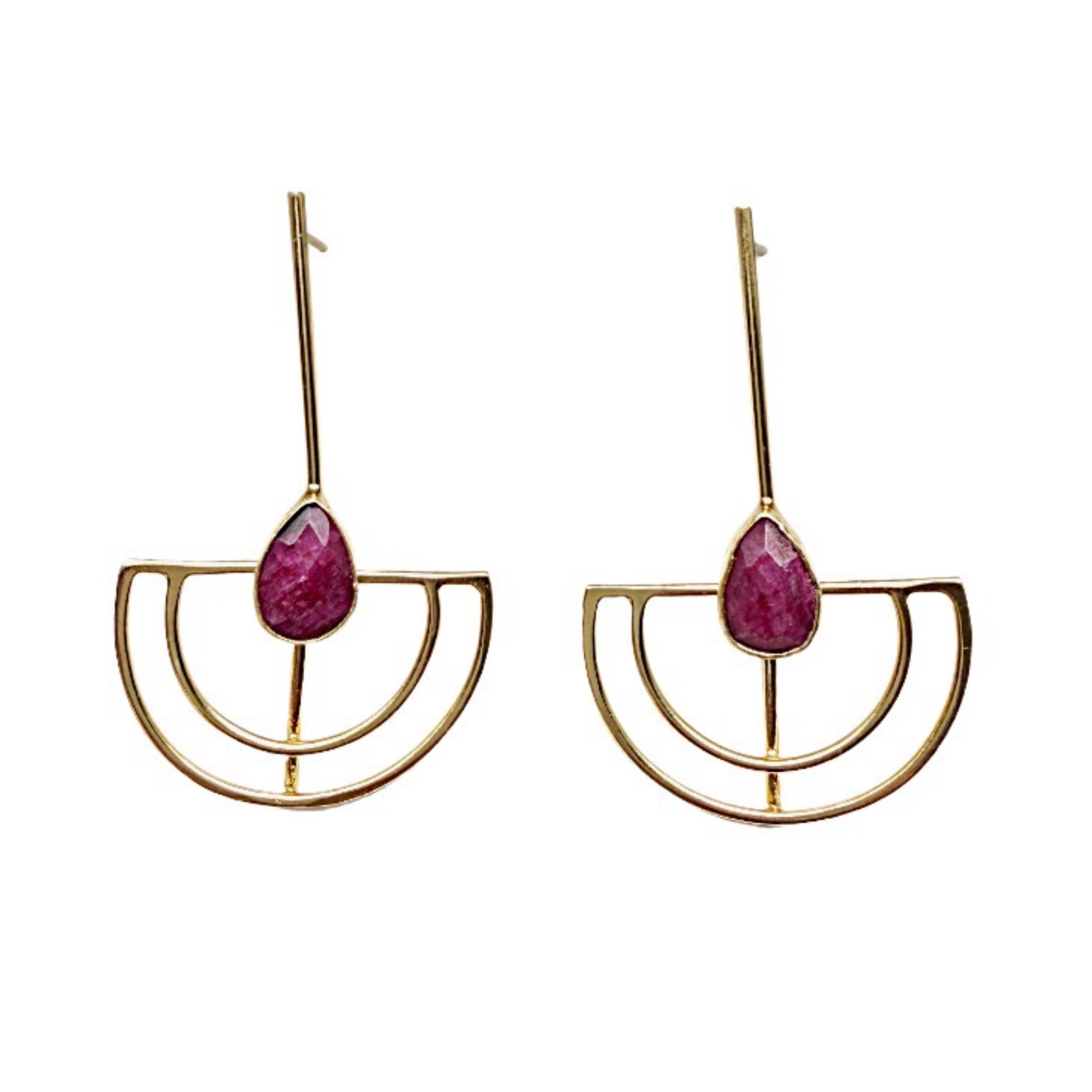 Gold-plated artisanal sustainable contemporary long geometric earrings with Ruby on white stone surface