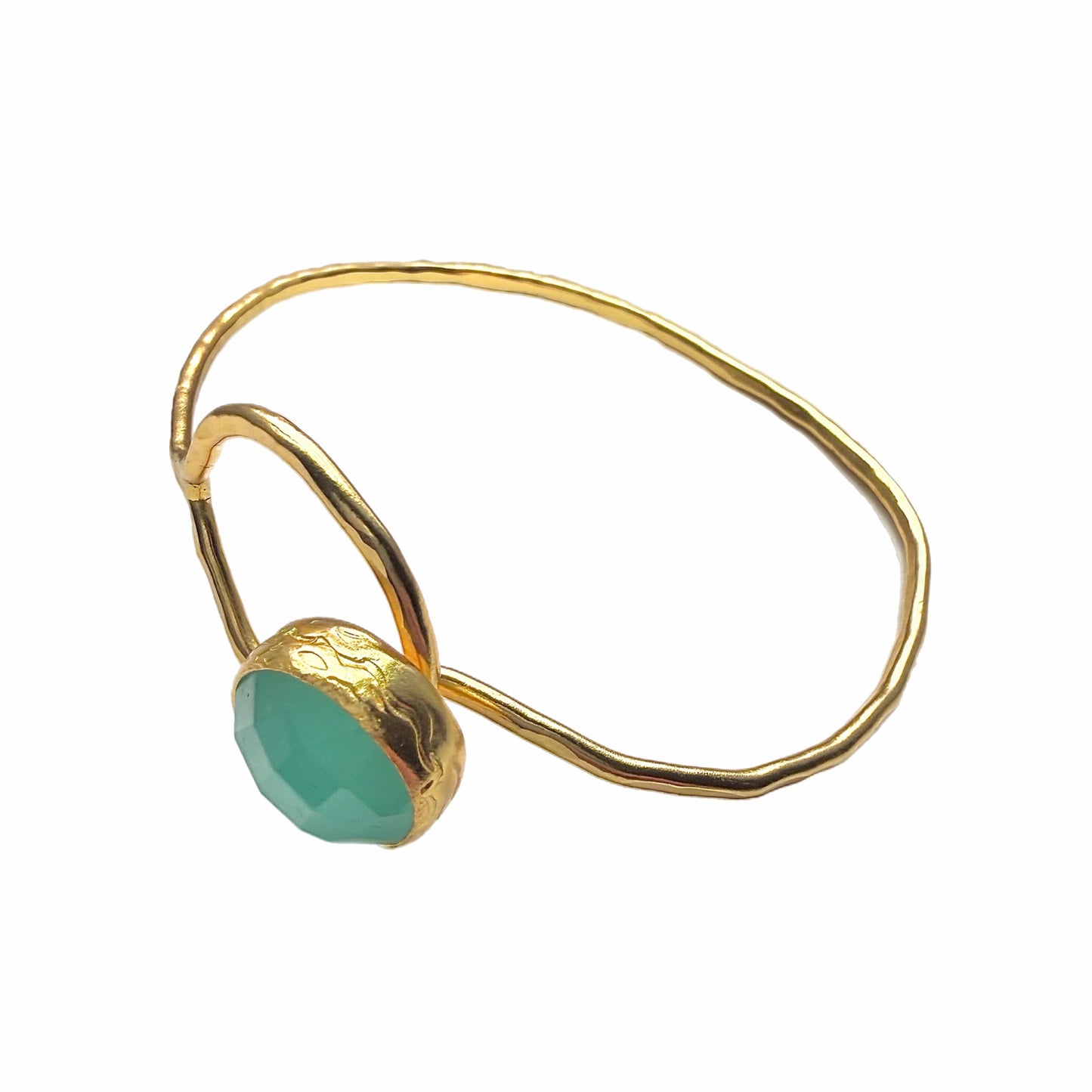 Gold-plated bracelet with a round Aqua chalcedony stone facing left on a white surface