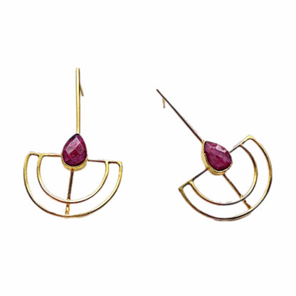 Gold-plated artisanal sustainable contemporary long geometric earrings with Ruby on a white backdrop 