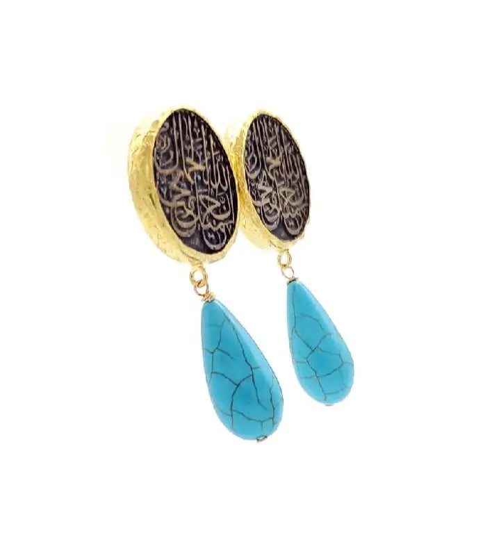 Unique antique finish handmade Arabic calligraphy Muslim Earrings with gold-played accents and turquoise drops on a white background