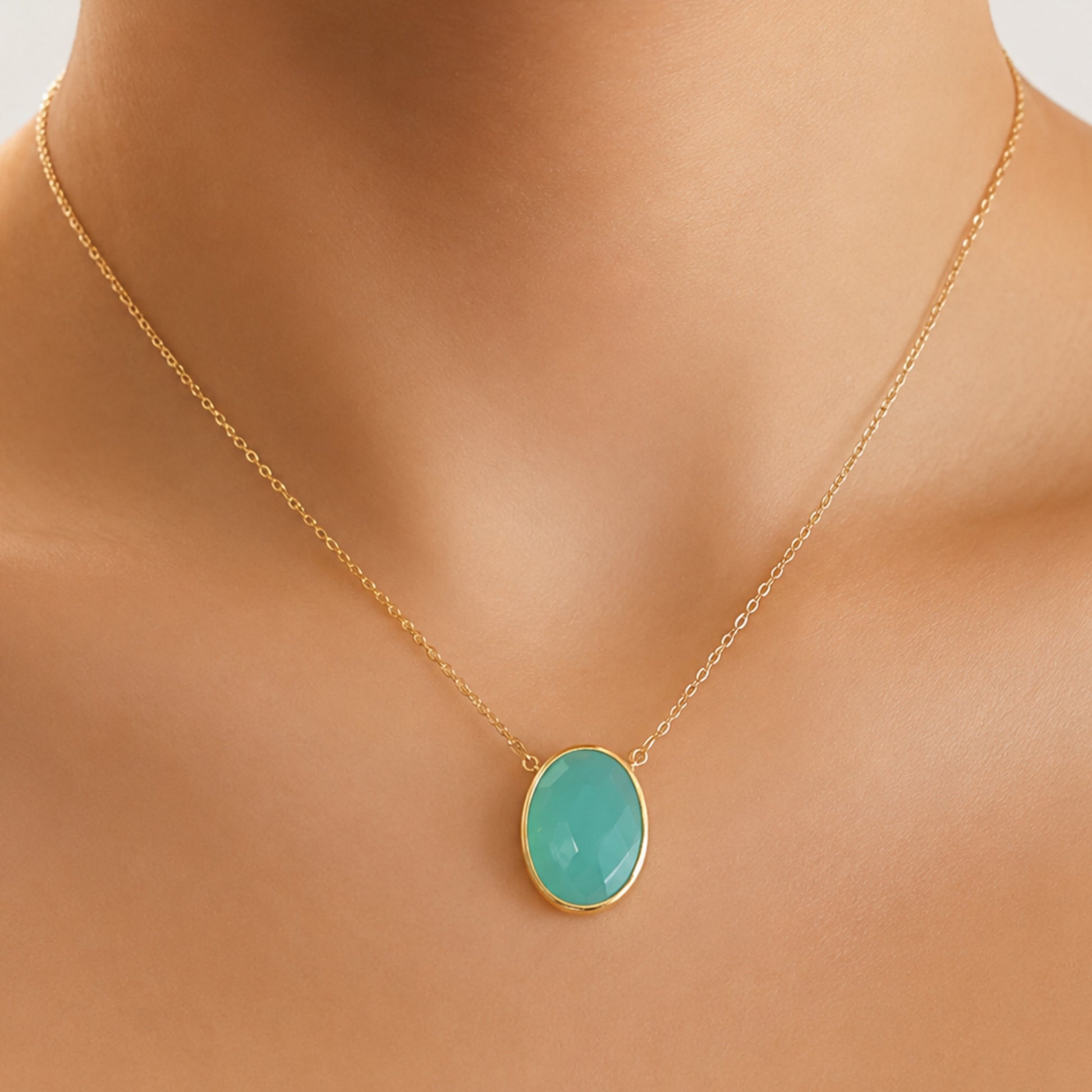 minimal gold chain faceted Aqua chalcedony pendant necklace on models neck