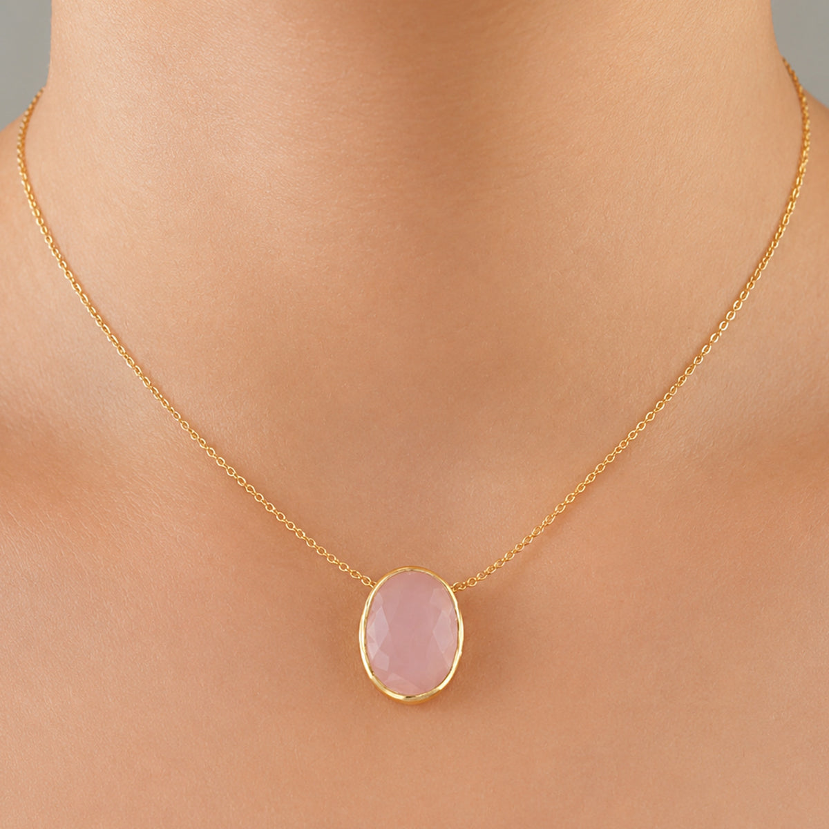 minimal gold chain faceted rose quartz pendant necklace in a on models neck