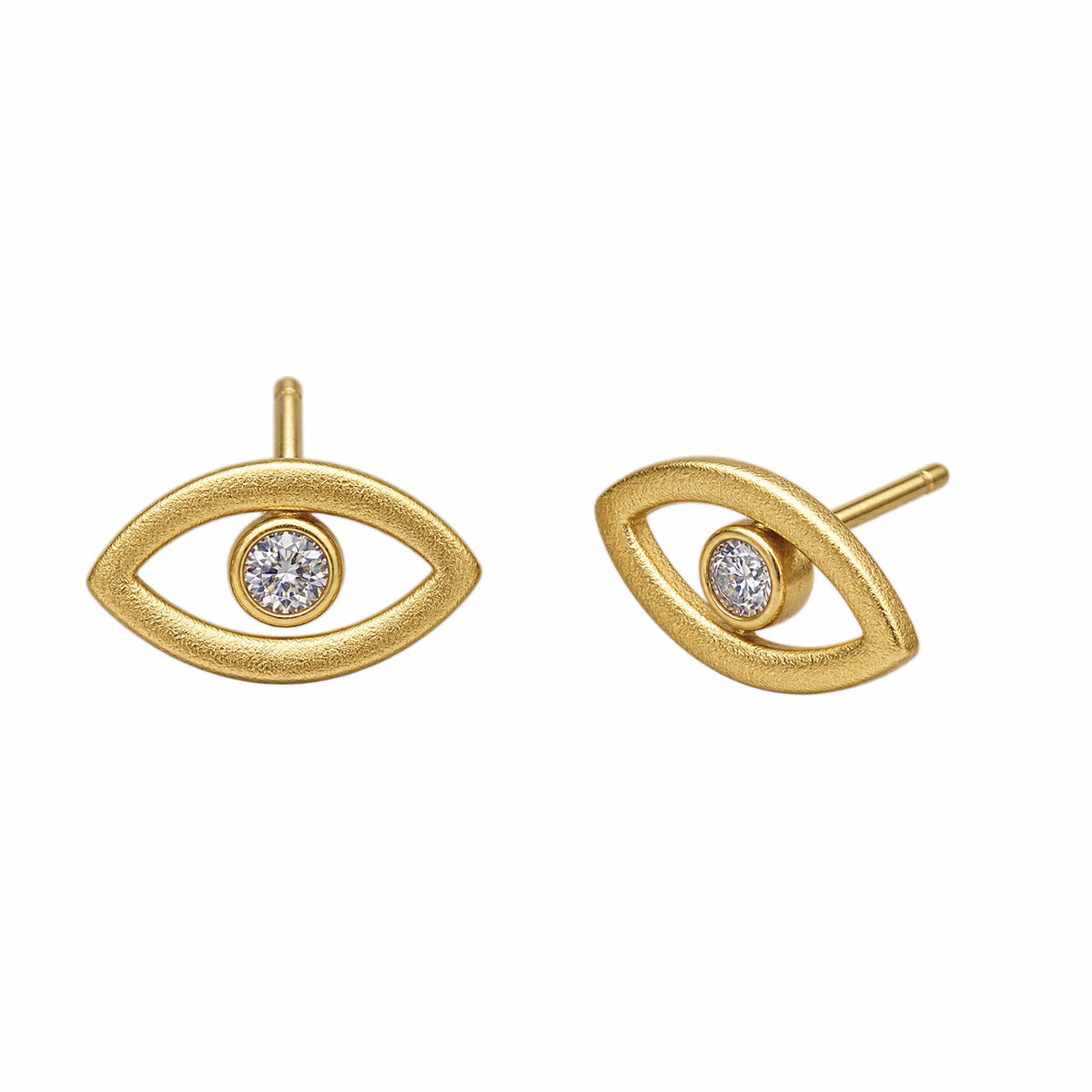 A pair of gold evil eye stud earrings with zircon center on white background 